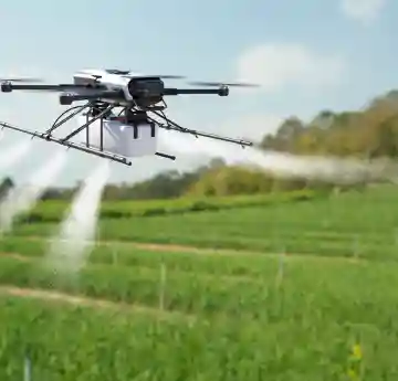 drone spraying in the field